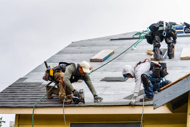 Professional Roofing technician working in Leavenworth, WA